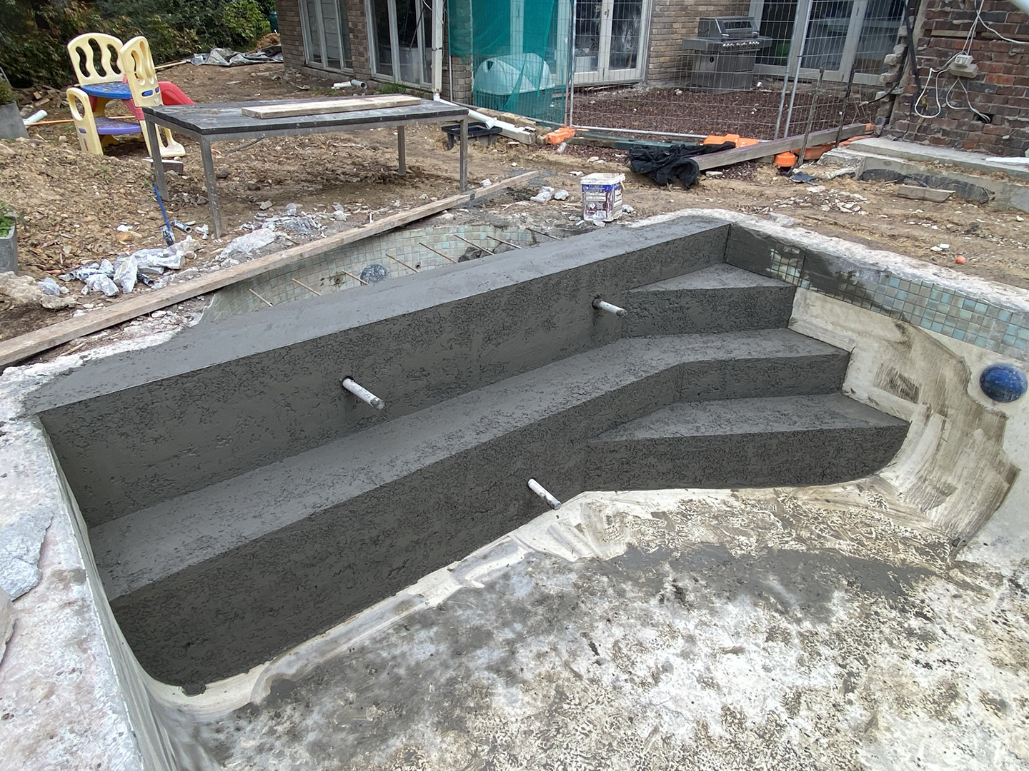 adding concrete steps to pool