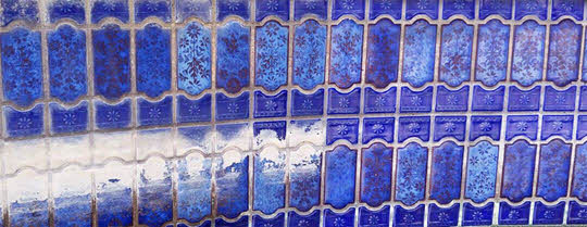 Pool_tile_cleaning_ceramic_mosaics_calcium_water_stain Professional Pool Cleaning: Local Pool Renovations
